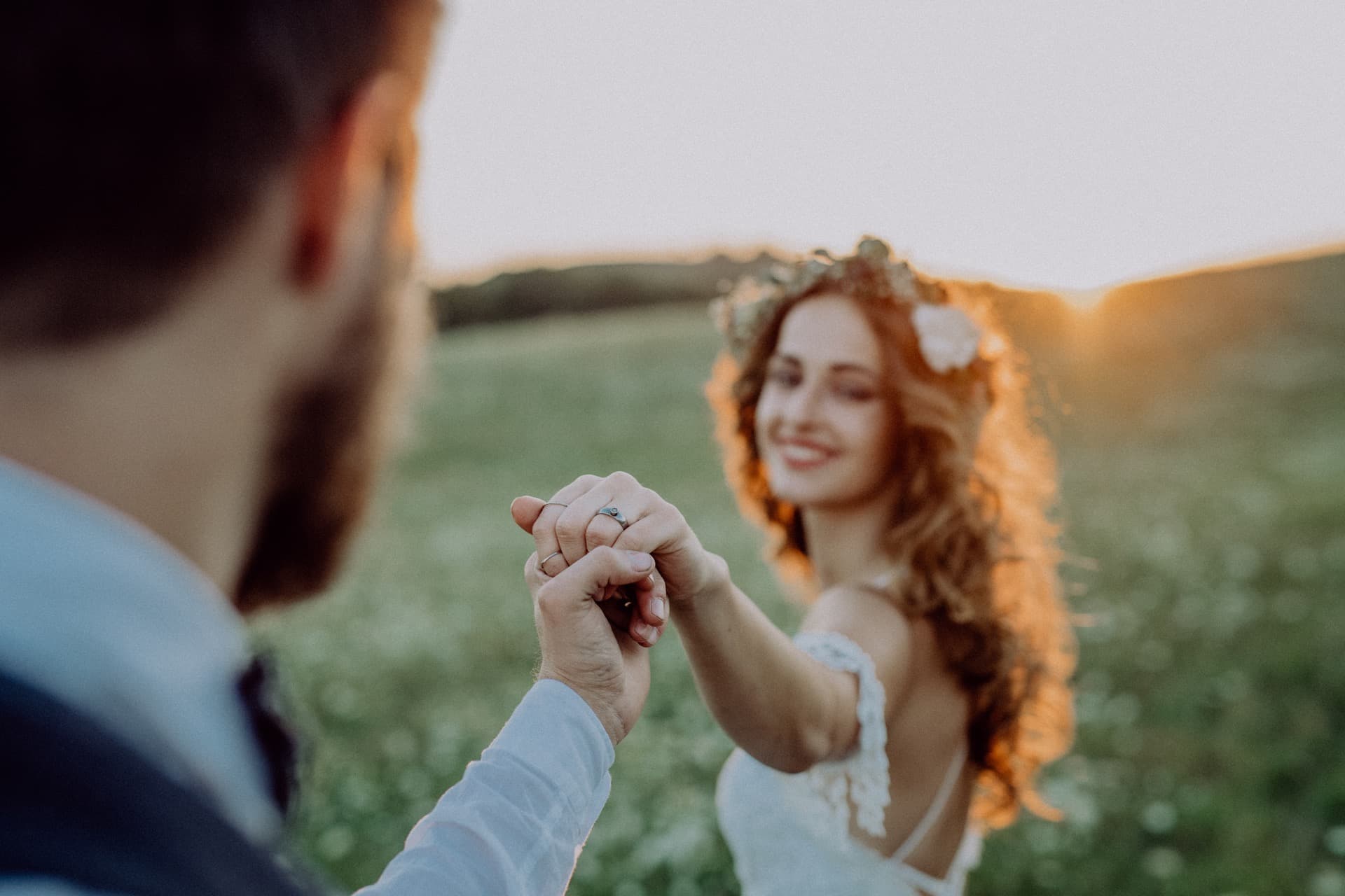 Young bride and groom in green nature