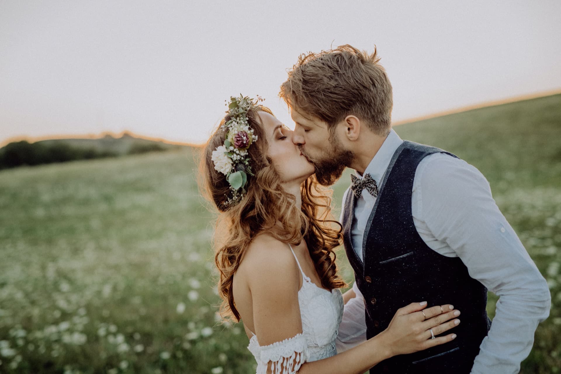 Young bride and groom Kissing